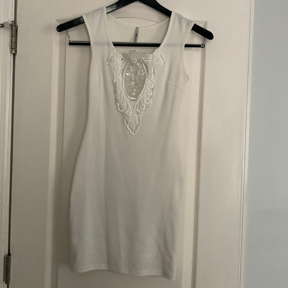 Size Small bodycon dress, form fitting off white with lace.